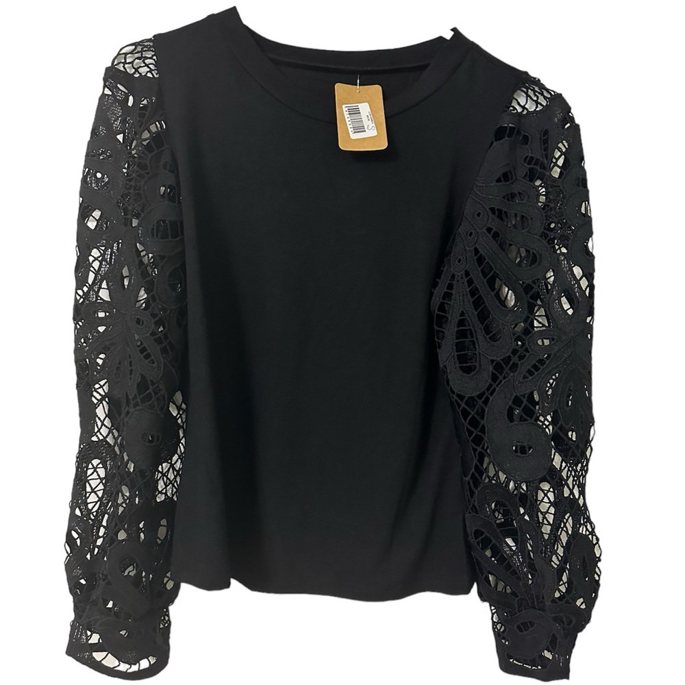 NWT Boutique black long sleeve blouse with intricate detailed sleeve pattern!!!